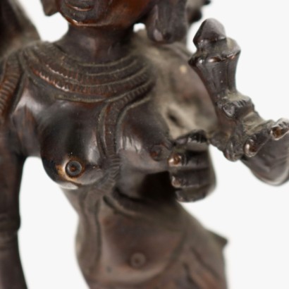 Krishna con una escultura de bronce Gopi